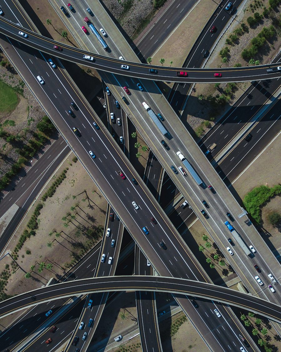 Aerial view of a highway interchange with traffic